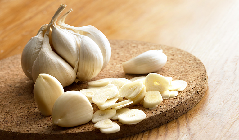 Garlic contains a high level of sulfur that boosts hair growth and reduces hair fall.