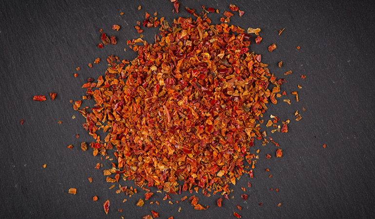 Pepper flakes' spicy scent keeps mice away.