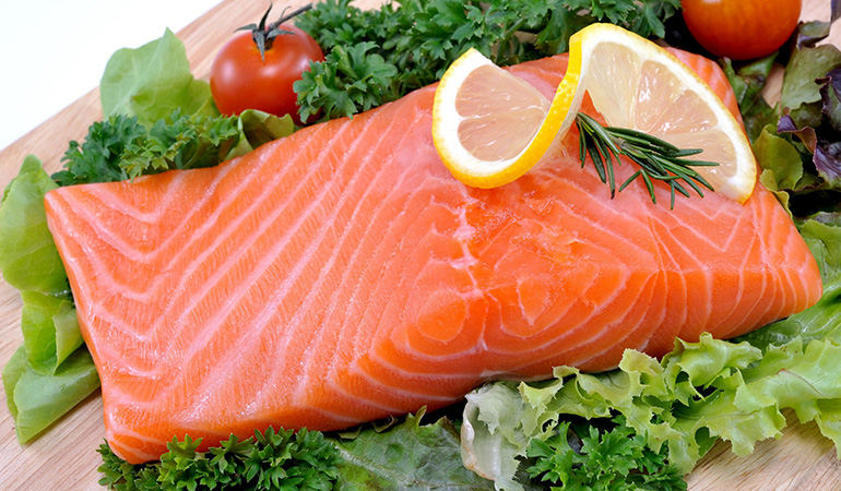 Salmon and other fatty fish contain omega-3 fats that reduce the bad fat