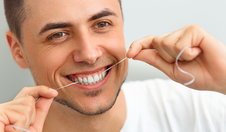 Flossing is the most effective way of getting at those tiny spaces in between your teeth and removing bad bacteria and residue.