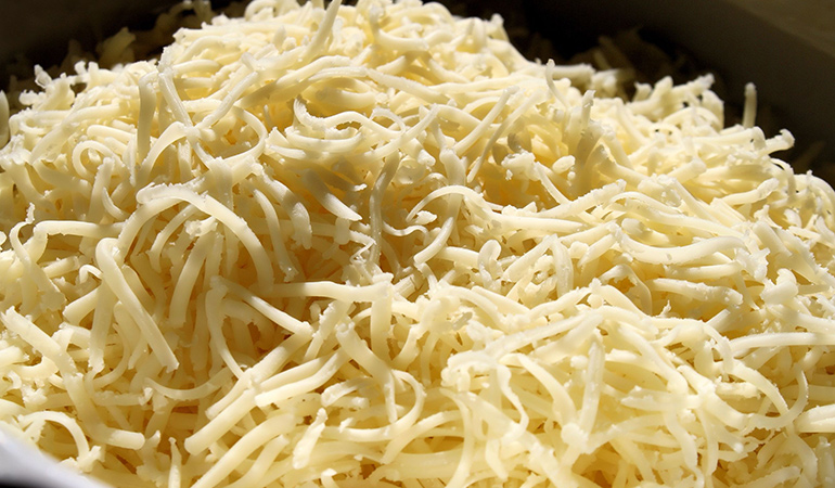 Sawdust helps prevent sticking of cheese together