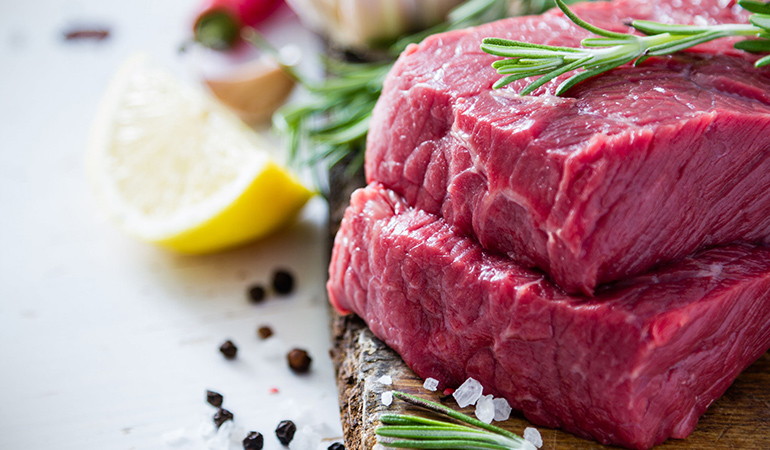 Frozen or pre-cooked meat can get you used to cooking raw meat