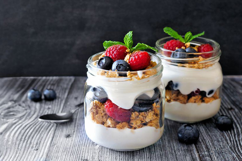 Greek yogurt parfaits are high in protein and gives you plenty of nutrients when paired with nuts and fruits.