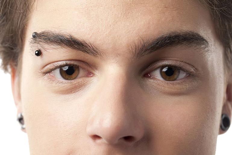 Eyebrow piercing can cause pimples on eyebrows