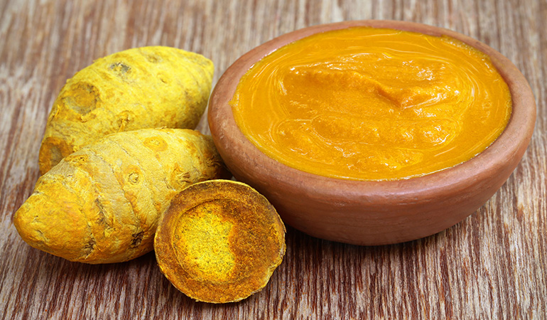 Natural face pack made with turmeric and gram flour
