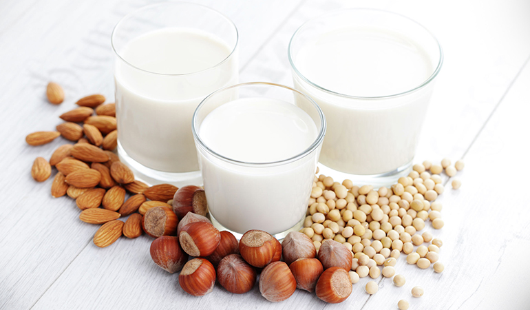 Use soy milk or almond milk to make your coffee healthy