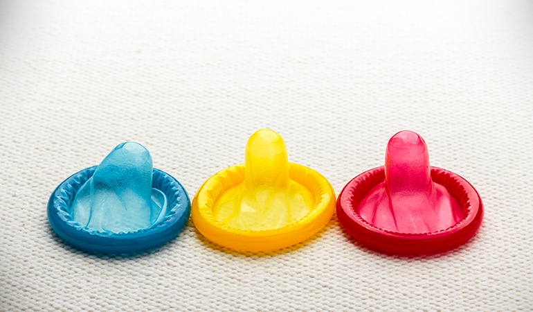 Fragrance, flavor, colors, or pleasure enhancers are added to condoms