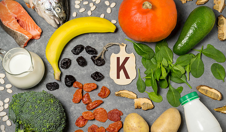 To reduce bloating during your period, eat potassium-rich foods