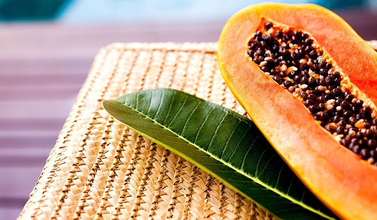 The enzyme papain in papaya has skin-lightening properties