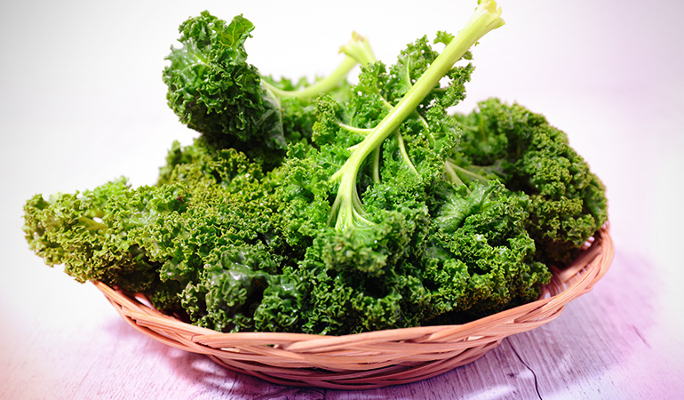Half a cup of boiled kale contains 531 mcg of vitamin K.