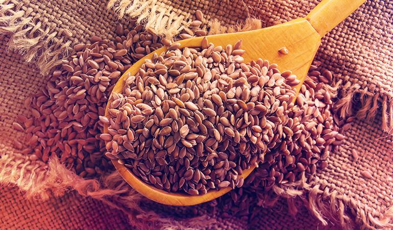 A tablespoon of the flaxseeds, whole, contain 2.35 gm of ALA