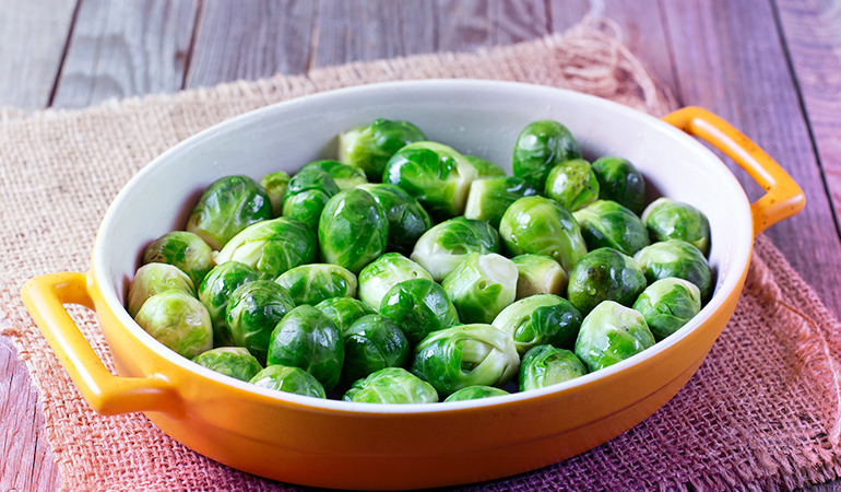 Half a cup of cooked Brussels sprouts has about 109.4 mcg of vitamin K.