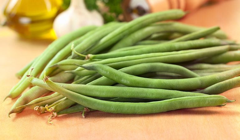 A cup of cooked green beans: 2 mcg, 5.7% of the DV