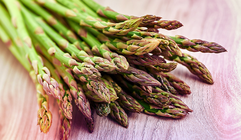 Half a cup of cooked chopped asparagus gives 45.5 mcg of vitamin K.