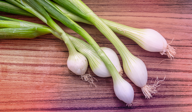 Half a cup of chopped scallions has 103.5 mcg of vitamin K.